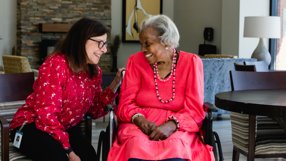 social worker engaging with RiverSpring Living resident
