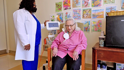 Wearable tech vest encoding real time health insights to prevent hospitalizations