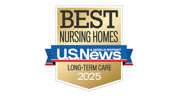 A gold and white badge displaying “Best Nursing Homes, U.S. News & World Report, Long-Term Care, 2025” recognizes exceptional senior care at Hebrew Home in Riverdale.